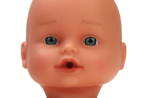 白い背景に赤ちゃん人形のおもちゃの頭 — ストック写真