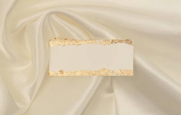 Gold Glitter Empty Canvas Paper Frame Beige Silk Fabric Background — Stock Photo, Image