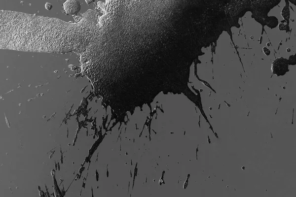 Abstrakte Schwarze Körnung Sprühfarbe Klecks Tropfen Grauen Hintergrund — Stockfoto