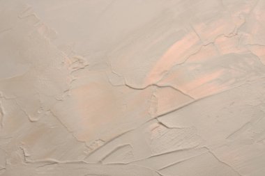 Sanat yağı ve akrilik leke bezi duvar boyası. Soyut desen bej, nacre glitter renk lekesi fırça darbesi yardım dokusu arka planı