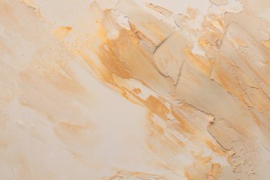 Sanat yağı ve akrilik leke bezi duvar boyası. Soyut doku beyaz, bej, altın rengi parıltılı boya fırça darbesi yardım tahıl dokusu arka plan