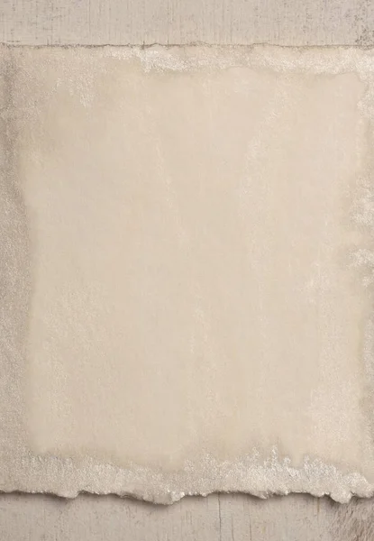 Beige and nacre gray frame painting paper empty card on wood wall. Abstract texture copy space neutral grunge background.