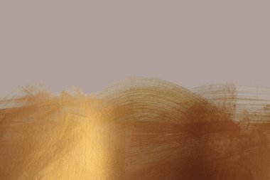 Bej ve altın rengi mürekkep lekesi leke lekesi parlak kağıt desen arka plan.