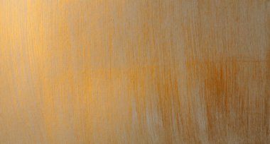 Altın bronz parıltı metalik suluboya fırça darbesi kağıt deseni arka plan duvarı.