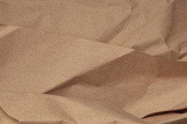 Alçı defteri bej rengi buruşuk paket eski el işi kağıt boş doku kopyalama arkaplanı.