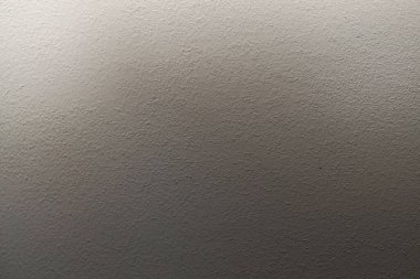 Bej rengi gri tahıl bulanık doku duvarı. Işık ve gölge dumanı soyut arkaplan. 