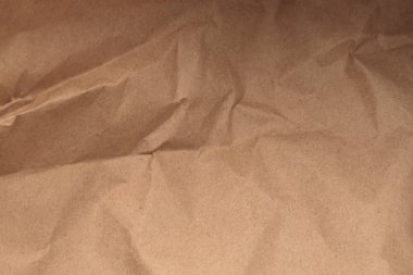 Bej rengi kahverengi buruşuk paket eski el işi kağıtlar boş. Işık ve gölge dokusu kopyalama alanı arkaplanı.