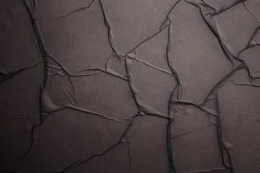 Boş tahıl, buruşuk kahverengi bej, koyu renkli, boş, kabartma desen, fotokopi alanı ışığı, gölge duvar arka planı..