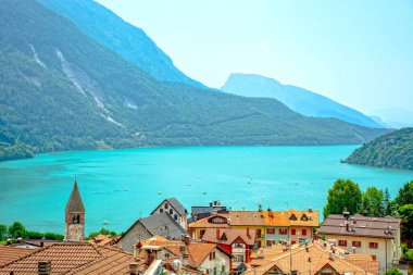 Molveno lake in Trentino, Italy with Brenta Dolomites in background  clipart