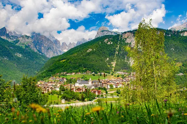 stock image Molveno resort village in Trentino, Italy with Brenta Dolomites in background 