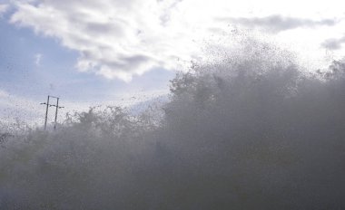 Liquid texture of water and blue sky