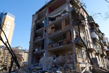 KYIV, UKRAINE, MARCH 20, 2022: After bombing. Russian terrorist army dropped missile and destroyed house in residential district in Kyiv city on March 18, 2022. Terror and genocide of Ukrainian people