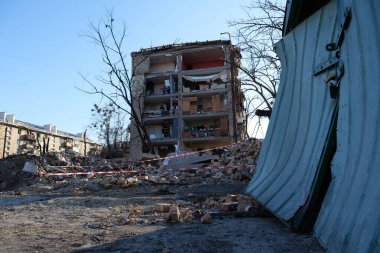 UKRAINE, KYIV, MARCH 20, 2022: Russian missile destroyed houses and garages in residential area in Kyiv city on March 18, 2022. After bombing, war in Ukraine, terror and genocide of Ukrainian people