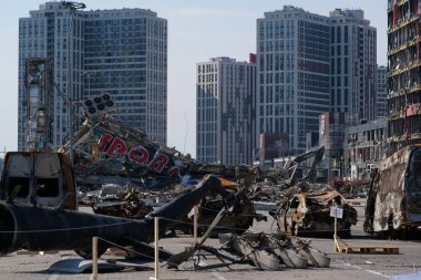 KYIV, UKRAINE, APRIL 15, 2022: Cars burned by russian missile. Missile destroyed shopping center Retroville on March 20. Terror and genocide of Ukrainian people. Russia - state of sponsor of terrorism