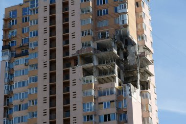 KYIV, UKRAINE, MAY 11, 2022: Russian missile damaged multi-storey dwelling building in Kiev city on February 26, 2022. Russian aggression. War in Ukraine. Terror and genocide of Ukrainian people