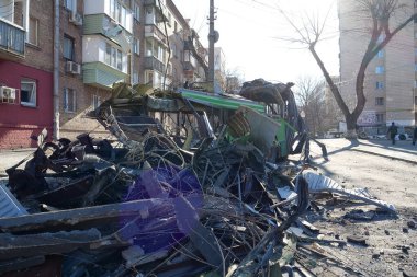 KYIV, UKRAINE, MARCH 20, 2022: After bombing. War in Ukraine. Russian missile destroyed trolleybus in Kyiv city on March 14, 2022. Terror and genocide of Ukrainian people