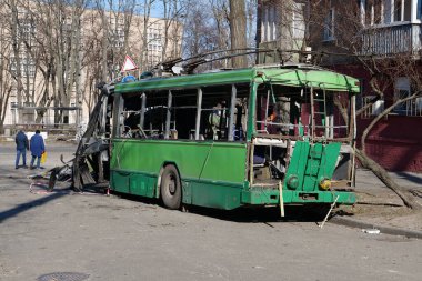 KYIV, UKRAINE, MARCH 20, 2022: After bombing. War in Ukraine. Russian missile destroyed trolleybus in Kyiv city on March 14, 2022. Terror and genocide of Ukrainian people