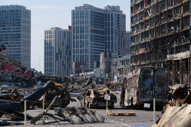 KYIV, UKRAINE, APRIL 15, 2022: Cars burned by russian missile. Missile destroyed shopping center Retroville on March 20. Terror and genocide of Ukrainian people. Russia - state of sponsor of terrorism