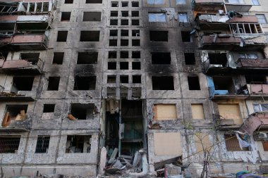 KYIV, UKRAINE, APRIL 15, 2022: After bombing. Russian terrorist army destroyed by shell dwelling house on Obolon district in Kyiv on March 2022. War in Ukraine. Terror and genocide of Ukrainian people