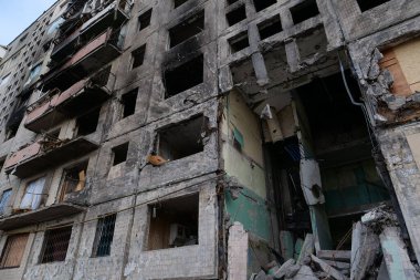 KYIV, UKRAINE, APRIL 15, 2022: After bombing. Russian terrorist army destroyed by shell dwelling house on Obolon district in Kyiv on March 2022. War in Ukraine. Terror and genocide of Ukrainian people