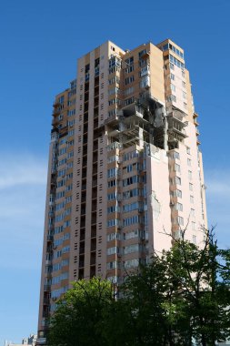 KYIV, UKRAINE, MAY 11, 2022: Russian missile damaged multi-storey dwelling building in Kiev city on February 26, 2022. Russian aggression. War in Ukraine. Terror and genocide of Ukrainian people