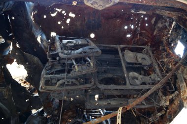 IRPIN, UKRAINE, JUNE 6, 2022: After bombing. Russian terrorist army burned cars, dwelling houses and killed people in Irpin town, Kyiv Oblast on March 2022. Terror and genocide of Ukrainian people