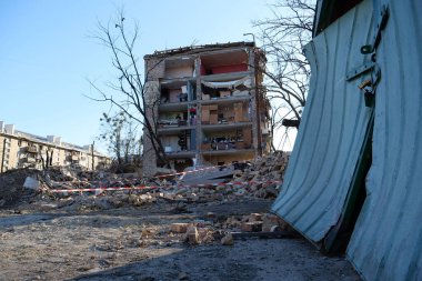 UKRAINE, KYIV, MARCH 20, 2022: Russian missile destroyed houses and garages in residential area in Kyiv city on March 18, 2022. After bombing, war in Ukraine, terror and genocide of Ukrainian people