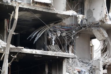 KYIV, UKRAINE, APRIL 29, 2022: After bombing. Dwelling house destroyed by russian missile in Kyiv city on end of April 2022. Russian aggression. War in Ukraine. Terror and genocide of Ukrainian people