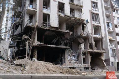 KYIV, UKRAINE, APRIL 29, 2022: After bombing. Dwelling house destroyed by russian missile in Kyiv city on end of April 2022. Russian aggression. War in Ukraine. Terror and genocide of Ukrainian people