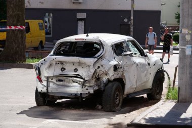 IRPIN, UKRAINE, JUNE 6, 2022: After bombing. Russian terrorist army damaged cars, dwelling houses and killed people in Irpin town, Kyiv Oblast on March 2022. Terror and genocide of Ukrainian people