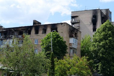 BUCHA, UKRAINE, JUNE 8, 2022: War in Ukraine. Russian army of terrorist and marauders damaged dwelling house in Bucha, Kyiv Region on March 2022. After bombing. Terror and genocide of Ukrainian people