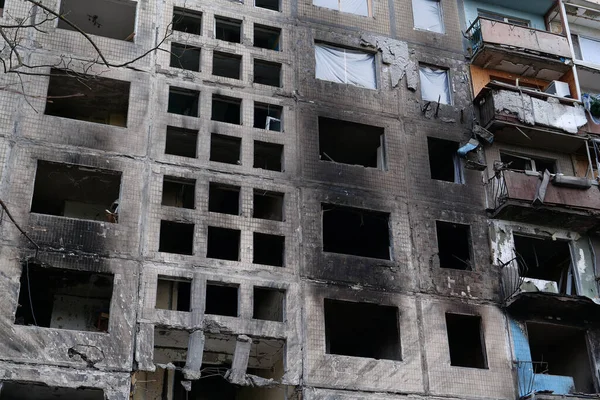 KYIV, UKRAINE, APRIL 15, 2022: After bombing. Russian terrorist army destroyed by shell dwelling house on Obolon district in Kyiv on March 2022. War in Ukraine. Terror and genocide of Ukrainian people