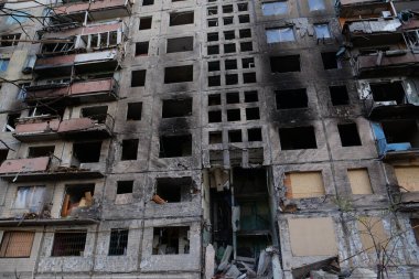 KYIV, UKRAINE, APRIL 15, 2022: After bombing. Russian terrorist army destroyed by shell dwelling house on Obolon district in Kyiv on March 2022. War in Ukraine. Terror and genocide of Ukrainian people