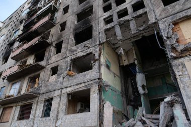 KYIV, UKRAINE, APRIL 15, 2022: After bombing. Russian terrorist army destroyed by shell dwelling house on Obolon district in Kyiv on March 2022. War in Ukraine. Terror and genocide of Ukrainian people