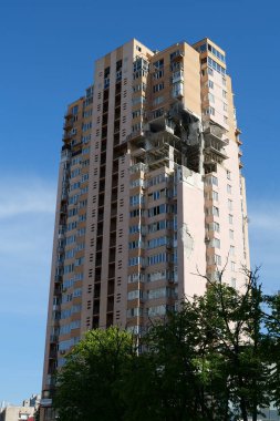 KYIV, UKRAINE, MAY 11, 2022: Russian missile damaged multi-storey dwelling building in Kiev city on February 26, 2022. Russian aggression. War in Ukraine. Terror and genocide of Ukrainian people