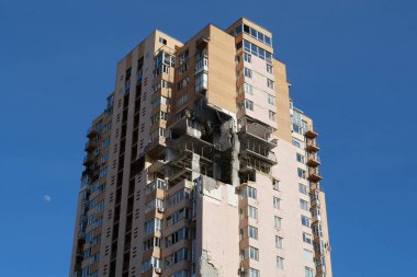 KYIV, UKRAINE, MAY 11, 2022: Russian missile damaged multi-storey dwelling building in Kiev city on February 26, 2022. Russian aggression. War in Ukraine. Terror and genocide of Ukrainian people