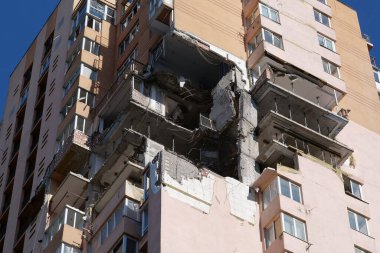 KYIV, UKRAINE, MAY 11, 2022: Russian missile damaged multi-storey dwelling building in Kiev city on February 26, 2022. Russian aggression. War in Ukraine. Terror and genocide of Ukrainian people