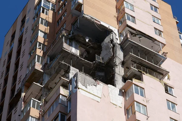 KYIV, UKRAINE, MAY 11, 2022: Russian missile damaged multi-storey dwelling building in Kiev city on February 26, 2022. Russian aggression. War in Ukraine. Terror and genocide of Ukrainian people