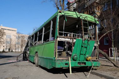 KYIV, UKRAINE, MARCH 20, 2022: After bombing. War in Ukraine. Russian missile destroyed trolleybus in Kyiv city on March 14, 2022. Terror and genocide of Ukrainian people
