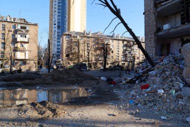 KYIV, UKRAINE, MARCH 20, 2022: After bombing. Russian terrorist army dropped missile and destroyed house in residential district in Kyiv city on March 18, 2022. Terror and genocide of Ukrainian people
