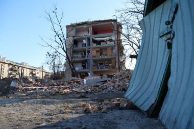 UKRAINE, KYIV, MARCH 20, 2022: Russian missile destroyed houses and garages in residential area in Kyiv city on March 18, 2022. After bombing, war in Ukraine, terror and genocide of Ukrainian people