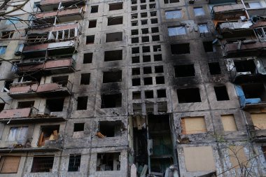 KYIV, UKRAINE, APRIL 15, 2022: After bombing. Russian terrorist army destroyed by shell dwelling house on Obolon district in Kyiv on March 2022. War in Ukraine. Terror and genocide of Ukrainian people