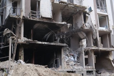 KYIV, UKRAINE, APRIL 29, 2022: After bombing. Dwelling house destroyed by russian missile in Kyiv city on end of April 2022. Russian aggression. War in Ukraine. Terror and genocide of Ukrainian people