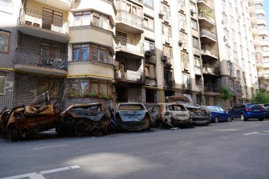 IRPIN, UKRAINE, JUNE 6, 2022: After bombing. Russian terrorist army burned cars, dwelling houses and killed people in Irpin town, Kyiv Oblast on March 2022. Terror and genocide of Ukrainian people