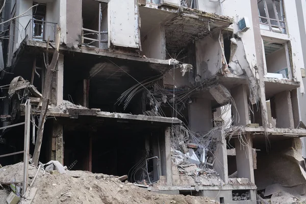 KYIV, UKRAINE, APRIL 29, 2022: After bombing. Dwelling house destroyed by russian missile in Kyiv city on end of April 2022. Russian aggression. War in Ukraine. Terror and genocide of Ukrainian people