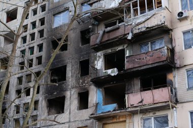 KYIV, UKRAINE, APRIL 15, 2022: After bombing. Russian terrorist army destroyed by shell dwelling house on Obolon district in Kyiv on March 2022. War in Ukraine. Terror and genocide of Ukrainian people