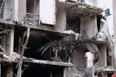 KYIV, UKRAINE, APRIL 29, 2022: After bombing. Dwelling house destroyed by russian missile in Kyiv city on end of April 2022. Russian aggression. War in Ukraine. Terror and genocide of Ukrainian people