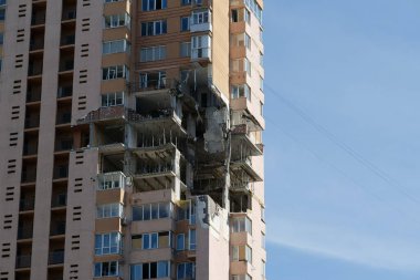 KYIV, UKRAINE, MAY 11, 2022: Russian missile damaged multi-storey dwelling building in Kiev city on February 26, 2022. Russian aggression. War in Ukraine. Terror and genocide of Ukrainian people