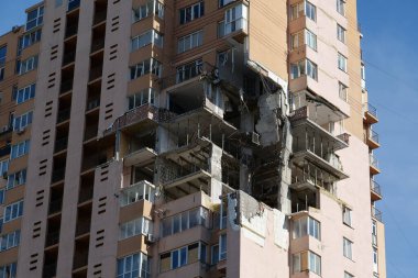KYIV, UKRAINE, MAY 11, 2022: Russian missile damaged multi-storey dwelling building in Kiev city on February 26, 2022. Russian aggression. War in Ukraine. Terror and genocide of Ukrainian people