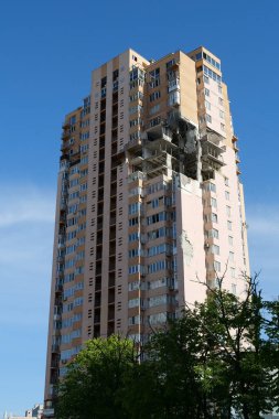 KYIV, UKRAINE, MAY 11, 2022: Russian missile damaged multi-storey dwelling building in Kiev city on February 26, 2022. Russian aggression. War in Ukraine. Terror and genocide of Ukrainian people
